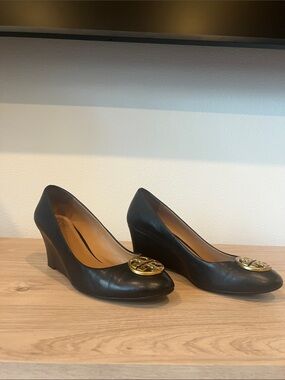 Tory Burch Black Leather Wedge Pumps with Gold Logo Medallion